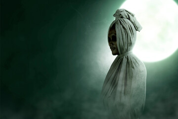 Obraz premium Pocong is covered with a white linen shroud standing