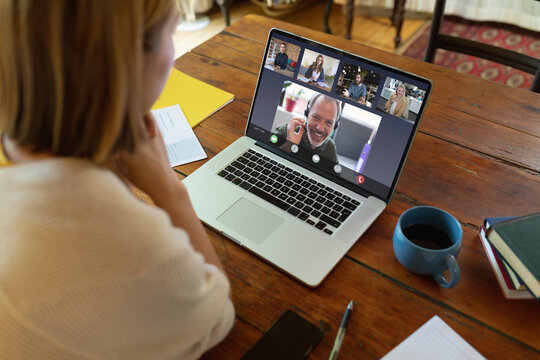 Asian businesswoman having video call with colleagues