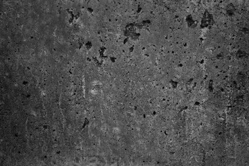 Old dark grey concrete wall. Grunge textured background