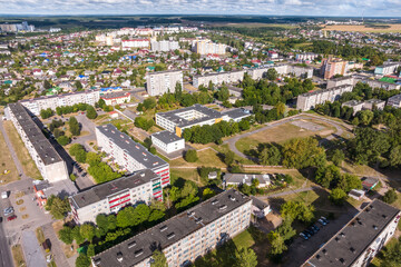 panoramic view from a great height of a small provincial town with a private sector and high-rise...