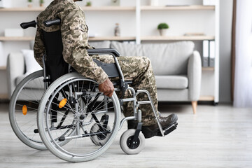 Cropped of black veteran in wheelchair rolling by home - obrazy, fototapety, plakaty