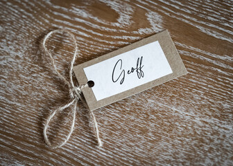Personalised name Geoff place card with string label beautiful crafted placard.  Laid on solid oak...