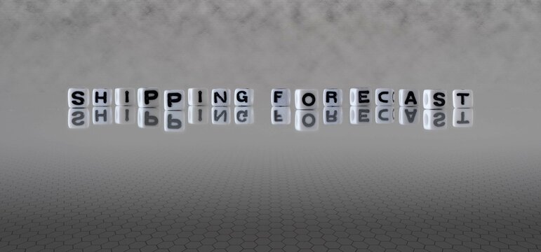 shipping forecast word or concept represented by black and white letter cubes on a grey horizon background stretching to infinity