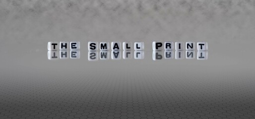 the small print word or concept represented by black and white letter cubes on a grey horizon...