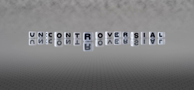 uncontroversial word or concept represented by black and white letter cubes on a grey horizon background stretching to infinity