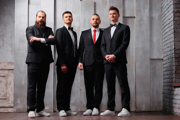 Fototapeta premium Group of handsome elegant young men in toxedo.