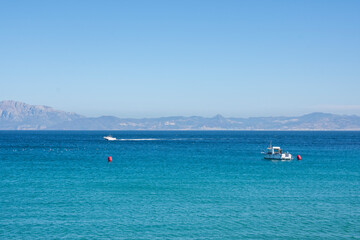 Obraz premium A view of a boat between Tarifa and Marruecos