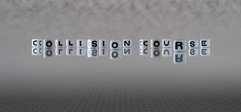 collision course word or concept represented by black and white letter cubes on a grey horizon background stretching to infinity