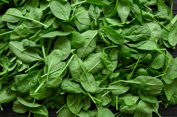 Fototapeta na wymiar Spinach background full image. Top view