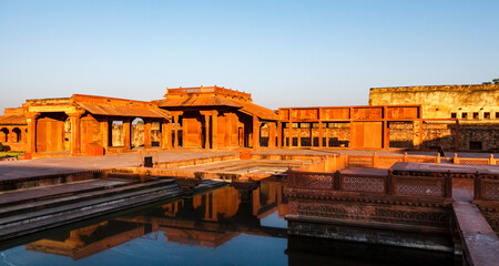 A red sandstone pavilion looking like a wooden structure in Fatehpur Sikri, Agra, Uttar Pradesh, India, Asia