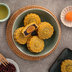 Delicious Cantonese moon cake for Mid-Autumn Festival food mooncake on gray table background.
