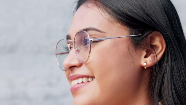 Vision, style or fashion glasses for woman with designer, trend or cool optometry eye care. Zoom on smile, happy face or street model by city wall background and prescription or insurance eyes lenses