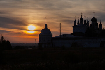 Fototapeta premium The abolished Goritsky Assumption Monastery in the city of Pereslavl-Zalessky at sunset