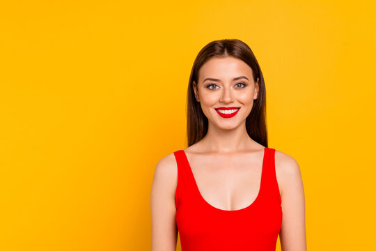 Portrait of charming positive lady toothy beaming smile wear swim suit isolated on yellow color background