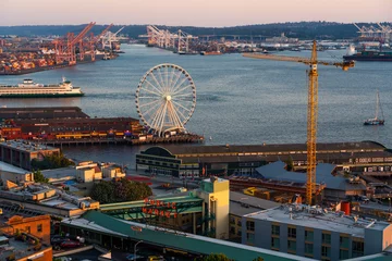 Deurstickers Seattle, Washington, USA, September 2022, aerial view of Seattle Waterfront pier area with The Seattle Great Wheel during sunset © Mario Hagen