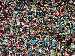 Close up of the famous  gum wall in Seattle makes a nice smell in the alley. The wall is located close to Pike Place Market