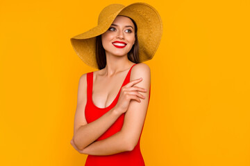 Photo of charming cheerful lady hand touch shoulder look interested empty space isolated on yellow color background