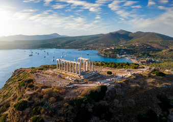 Aerial view of the beach and Temple of Poseidon at Cape Sounion at the edge of Attica, Greece,...