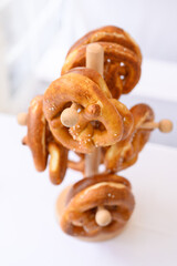 Close up shot of fresh baked pretzel on a white table in Munich Germany 