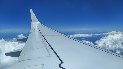 View from an Airplane during flight with clouds