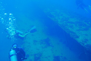 Fototapeta na wymiar The Seatiger shipwreck when SCUBA diving off of Oahu. Wreck diving adventures with Oahu Diving, your wreck dive specialist.