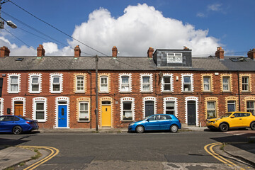 Colourful Terraced housing and parking along the South East of Dublin  - obrazy, fototapety, plakaty