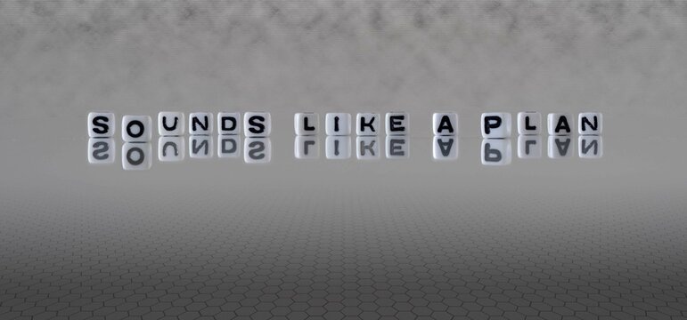 sounds like a plan word or concept represented by black and white letter cubes on a grey horizon background stretching to infinity