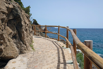 A path along the beautiful landscape of the Costa Brava coastline near Lloret de Mar, Spain.