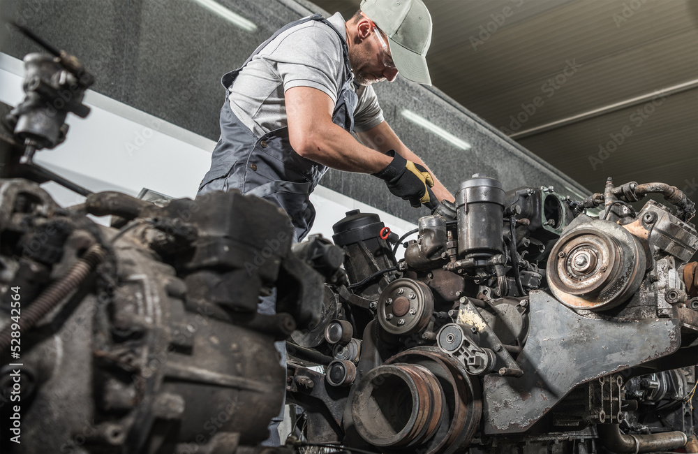 Wall mural truck mechanic rebuilding truck diesel engine