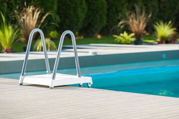 Obraz na płótnie Canvas Residential Outdoor Swimming Pool Ladder