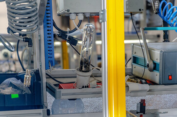 Industrial background. Production of lamps. Industrial equipment at a modern factory.