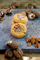 walnut cookies on a black background