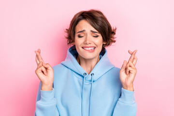 Closeup photo of young adorable pretty cute nice woman wear blue hoodie crossed fingers dreaming...