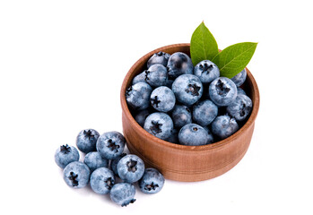 Blueberries with leaves isolated on white backgrounds.