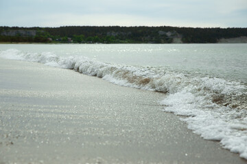 Waves on the sand beach on the island Baltic sea  - 528951391