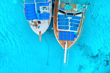 Top view of boats in turquoise sea bay
