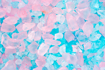 Obraz premium Salt crystals, sea salt as background and texture. Ice crystals Blue and pink