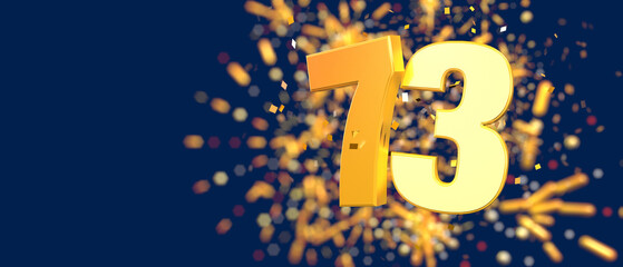 Gold number 73 in the foreground with gold confetti falling and fireworks behind out of focus