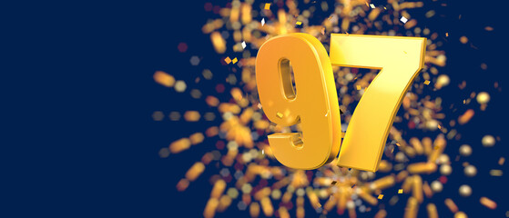 Gold number 97 in the foreground with gold confetti falling and fireworks behind out of focus - obrazy, fototapety, plakaty