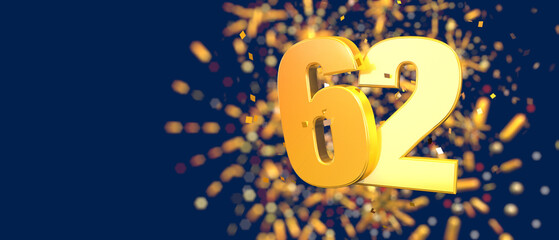 Gold number 62 in the foreground with gold confetti falling and fireworks behind out of focus