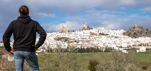 man travelling in Andalusia- white house village traditional
