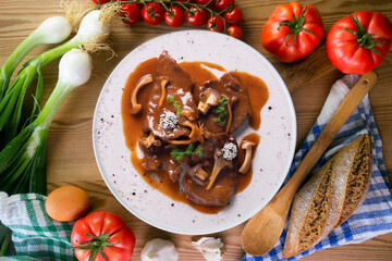 Fricando veal. Traditional Barcelona tapas cooked with a very fine fillet of high-quality beef and mushroom sauce.