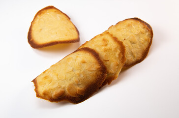 French delicacy pastry tuile with almond on wight background, High quality photo