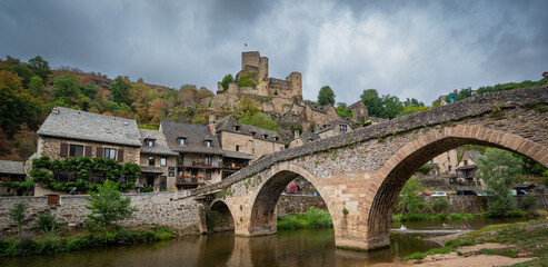 Fototapeta na wymiar Belcastel medieval castle and town in the south of France, Aveyron Occitania, view of the antique medieval stone buildings, High quality photo