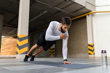 Fototapeta premium athletic strong hansome man on morning fitness workout exercise
