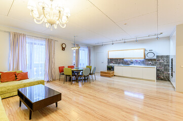 Russia, Moscow- May 21, 2020: interior apartment kitchen and dining room, refectory area cooking equipment, table furniture stove