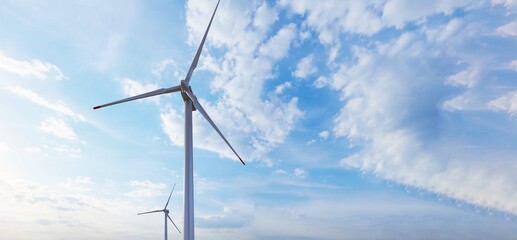 Ocean Wind Farm. Windmill farm in the ocean. Offshore wind turbines in the sea. Wind turbine from aerial view.