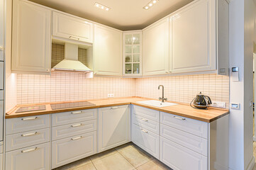 Russia, Moscow- May 21, 2020: interior apartment kitchen and dining room, refectory area cooking equipment, table furniture stove