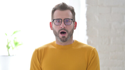 Portrait of Man Shocked by Results