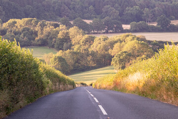 A beautiful rural country road in Gloucestershire, England- UK 